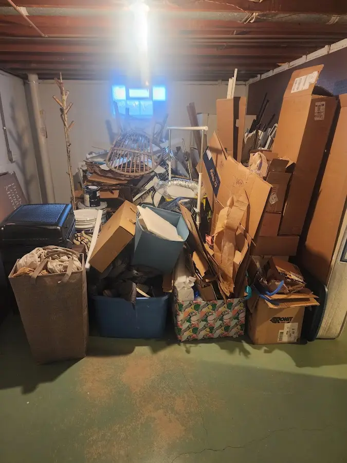 Roll-off dumpster container at job site for 2 Yard Dumpster Rental in Commercial